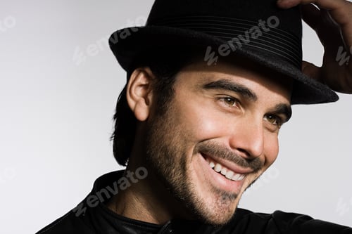 Preview: Profile of a young man wearing a fedora