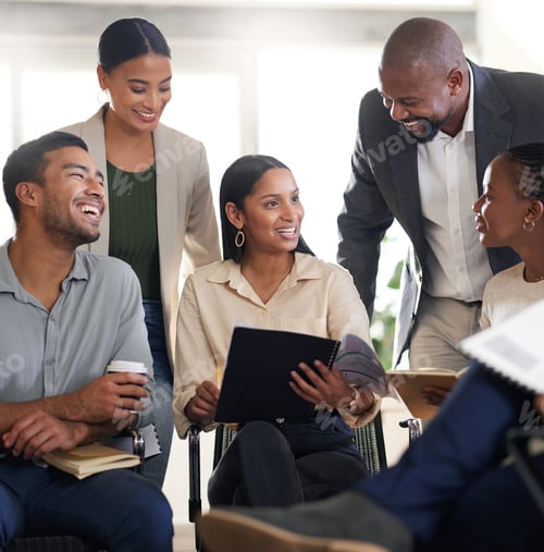Preview: Cropped shot of a diverse group of businesspeople sitting in the boardroom during a meeting
