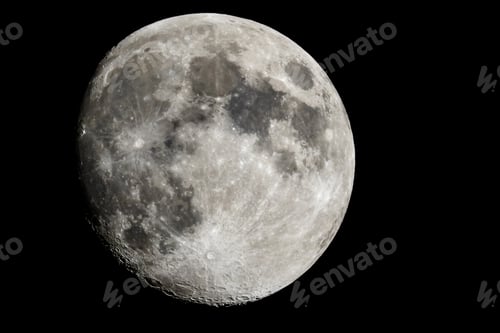 Detailed Surface of the Moon Against Black Sky