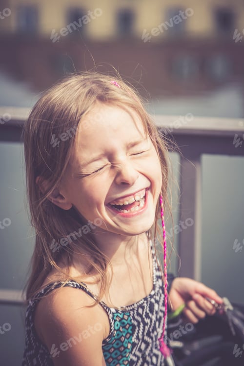 Preview: Portrait of laughing girl
