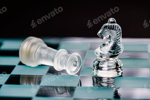 Preview: transparent glass chess on dark background, selective focus on horse piece, close-up