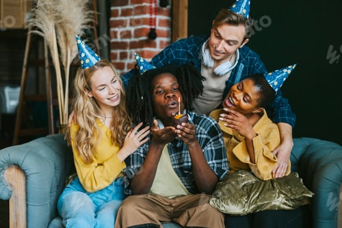 Preview: diversity and international group of young people friends students celebrate a birthday with a cake