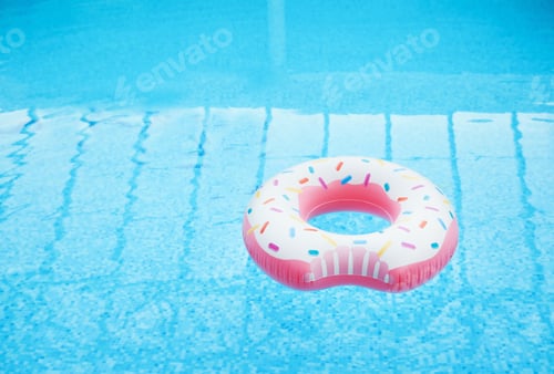 Preview: Inflatable ring floating on water in swimming pool