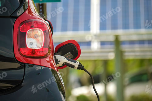 Preview: Electric plug-in car charging with electricity from solar renewable power source
