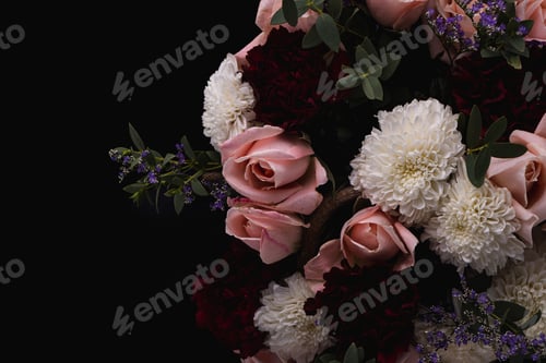 Preview: Closeup shot of a luxurious bouquet of pink roses and white, red dahlias on a black background