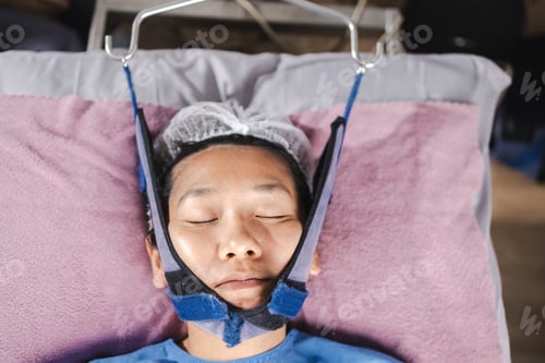 Preview: person undergoing physical therapy for neck traction, promoting relaxation and healing