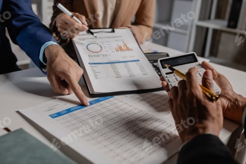 Preview: A group of business people are discussing company figures to resolve quarter of the year's losses, A