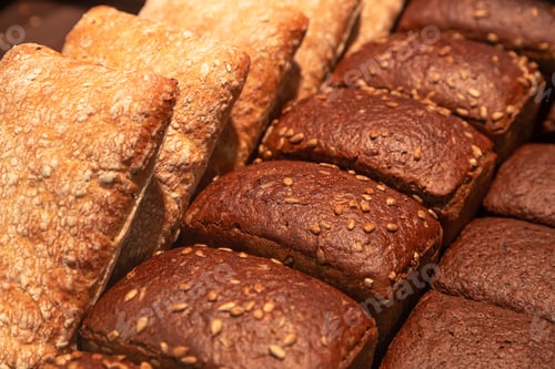 Preview: Set of breads stored for sale and consumption in supermarket.
