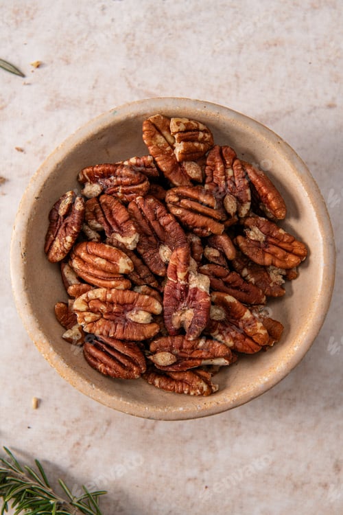 Preview: Bowl of Pecans on Light Surface