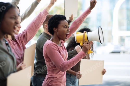 Preview: African american woman with megaphone leading public meeting, empty space