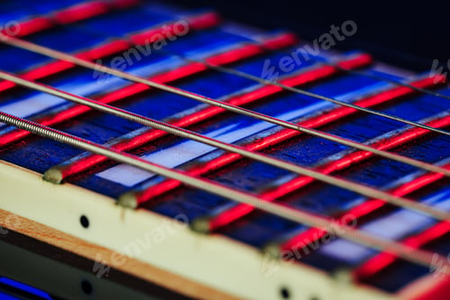 Preview: Guitar fingerboard with strings close up photo
