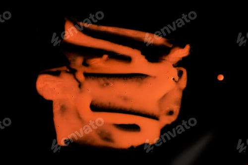 Preview: Neon orange paint on black