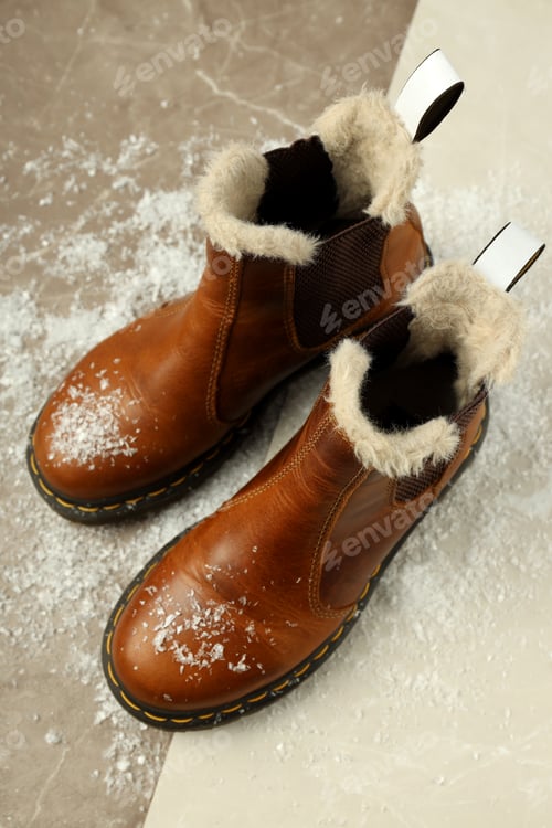 Preview: Boots with snow on two tone background