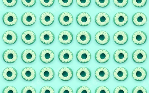Preview: Many small plastic donuts lies on a pastel colorful background. Flat lay minimal pattern. Top view