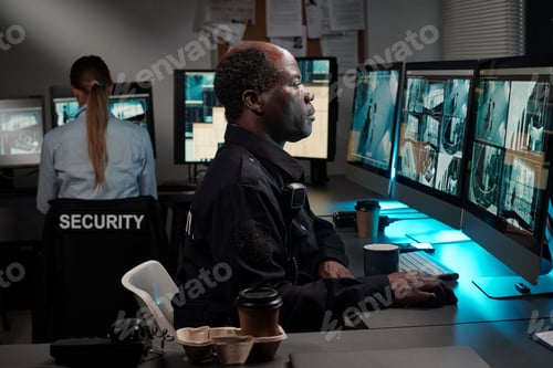 Preview: Officers working in surveillance room