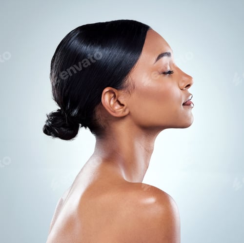 Elegant Woman Profile Portrait in Studio Setting