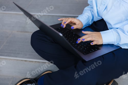 Preview: Close up of female hands typing on keyboard