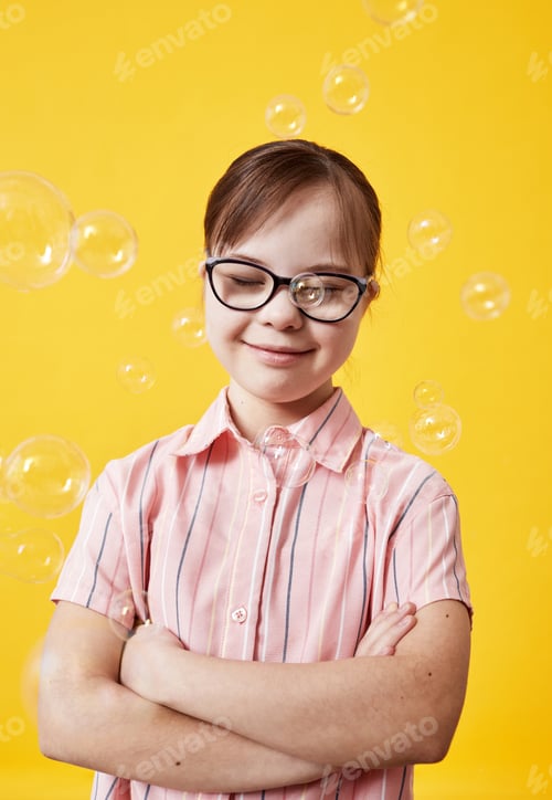 Preview: Cute Girl With Down Syndrome Wearing Eyeglasses