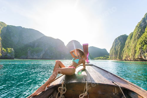Preview: Beautiful woman on a long-tail boat in Thailand