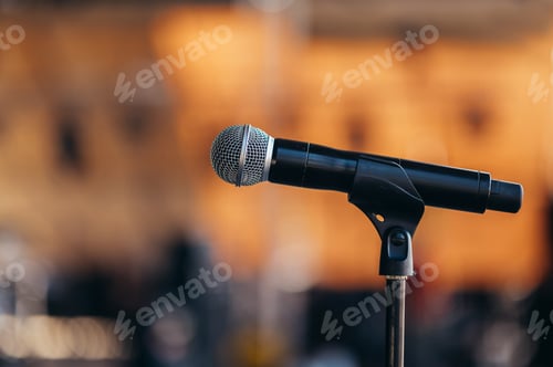Preview: Microphone standing on a stage on a concert