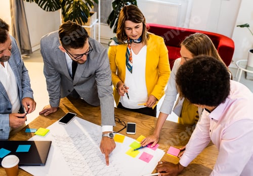 Preview: Group of business people working in office.