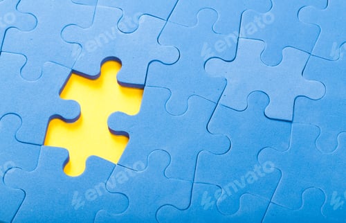 Preview: Puzzle pieces in blue with a missing piece highlighted on a yellow background