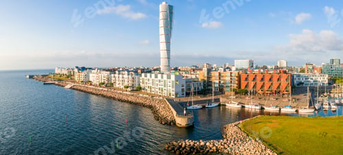 Preview: A coastal city in Sweden with the Turning Torso building in the middle of the photo