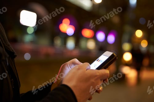 Preview: Person Using Mobile Phone