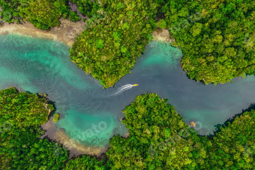 Preview: High angle shot of a little islets and islands in the middle of Indonesia