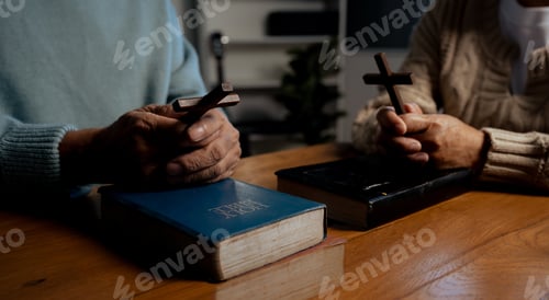 Preview: Men and women praying to God with the Bible.