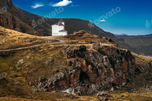 Preview: White house among the mountains. Beautiful autumn landscape. Small house in the mountains