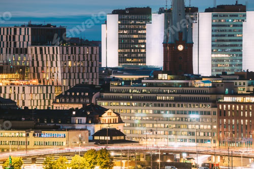 Preview: Stockholm, Sweden. Close View Of St. Clara Or Saint Klara Church And Houses In Twilight Dusk Lights