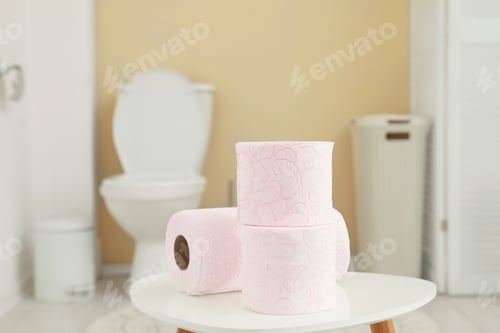 Preview: Toilet paper rolls on table in bathroom