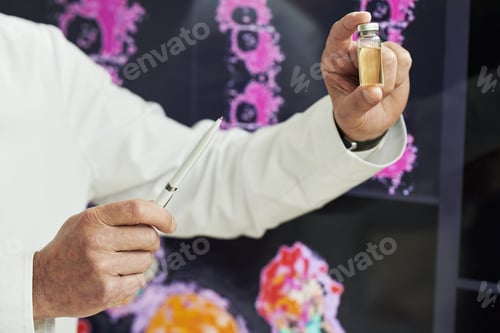 Preview: Hand of Scientist Presenting Vial with New Medicine at Conference