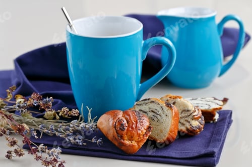 Preview: Sweet Bun with Poppy Seeds with a Cup of Coffee or Cappuccino