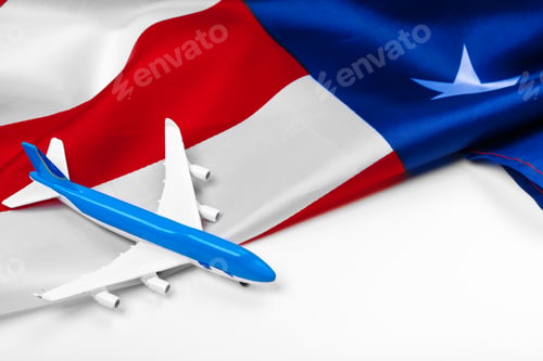 Preview: Plastic toy jet plane and flag of USA