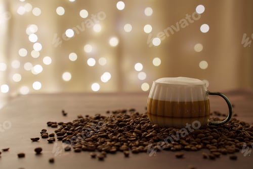 Preview: Cozy cappuccino in a mug with scattered beans and warm bokeh lights creating a serene ambiance.