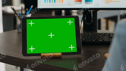 Preview: Startup specialist looks at tablet