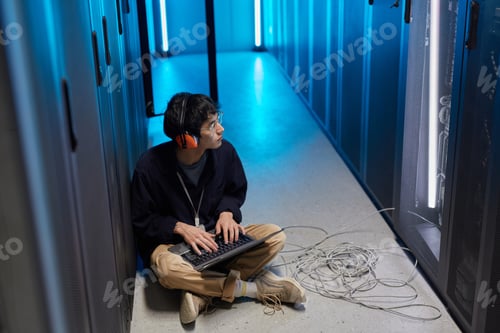 Preview: Young Network Engineer in Server Room