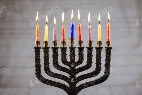 Preview: low key image of jewish holiday Hanukkah with menorah traditional Candelabra and wooden dreidels