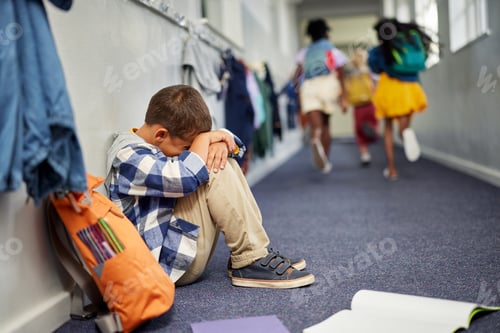 Preview: Schoolboy crying on floor after suffering an act of bullying