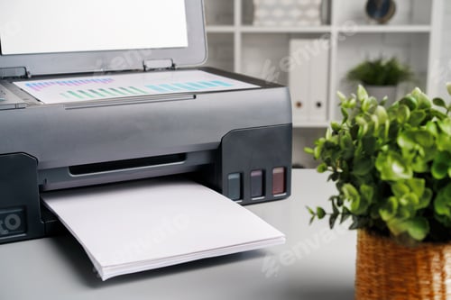 Preview: Close up of modern printer in the office