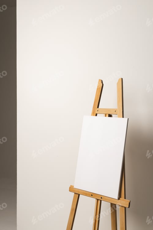 Preview: Blank Canvas on Easel with Soft Light