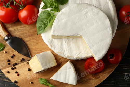 Preview: Concept of tasty eating with camembert and spices on wooden background