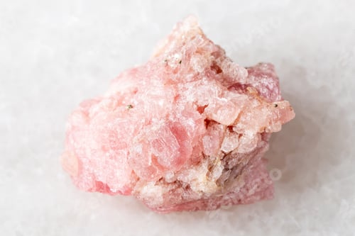 Preview: sample of raw rhodochrosite mineral on white