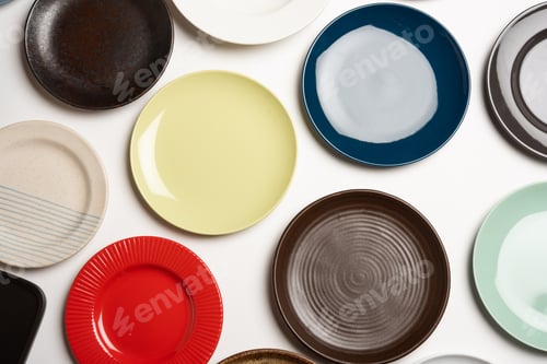Preview: Group of Empty colourful ceramic plates top view
