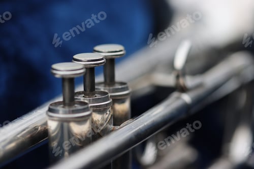 Preview: Selective focus shot of the details of a trumpet