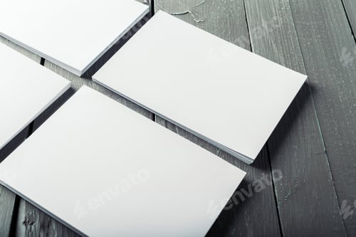 Preview: blank business cards on a wooden background