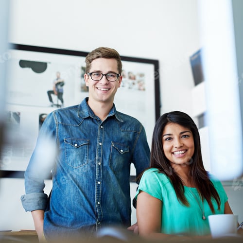 Preview: Passionate about design. Portrait of two designers in their office.