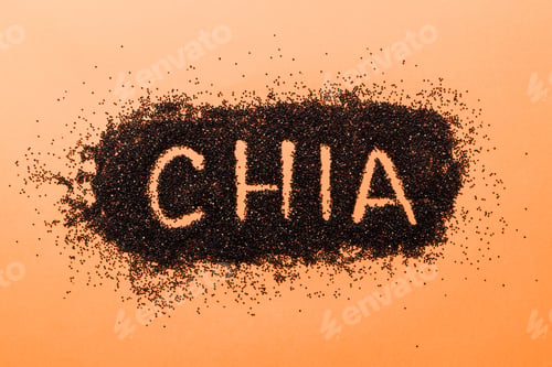 Preview: chia word made from chia seeds top view on colored background. Healthy superfood